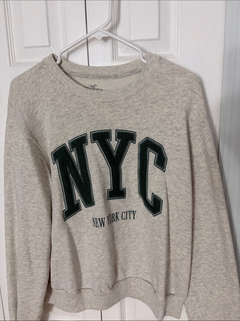 Hollister Cream Crewneck Sweatshirt with Dark Green NYC Graphic